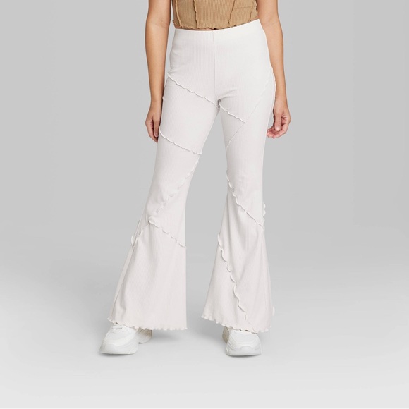 https://poshmark.ca/listing/Wild-Fable-cream-ribbed-flare-leggings-high-waisted-bell-bottom-lettuce-hem-644ac18b1741beddea096791